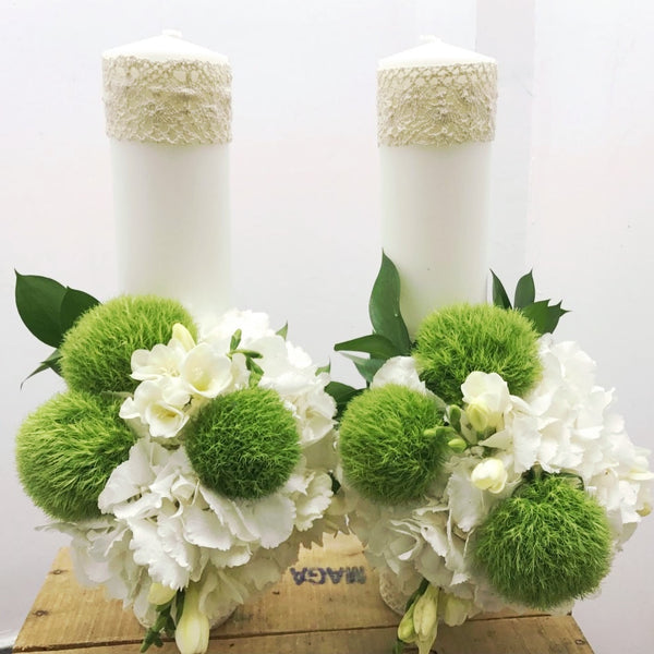 Short hydrangea and freesia wedding candles