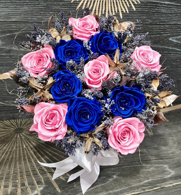 Cryogenic blue roses in a round box