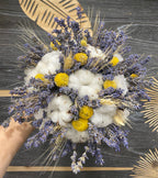 Rustic wedding bouquet of ears of wheat, cotton and craspedia