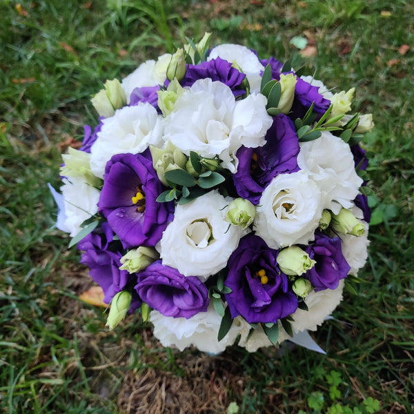 Wedding bouquet of white and purple lisianthus