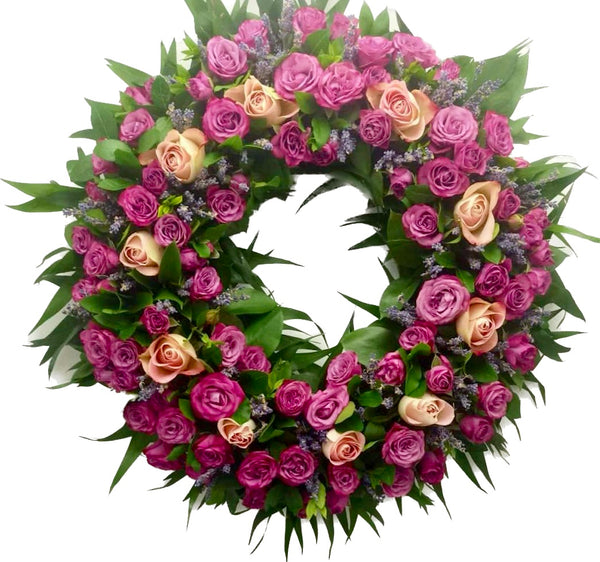 Round funeral wreath of roses