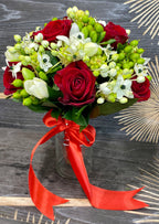 Classic bridal bouquet with roses, freesia, ornithogalum and hypericum