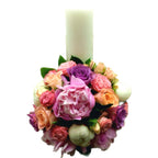 Candle christening peonies and roses