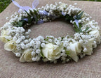 Flower crown made of white mini roses and the bride's flower