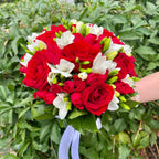 Wedding bouquet of roses, mini roses and freesias