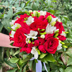Wedding bouquet of roses, mini roses and freesias
