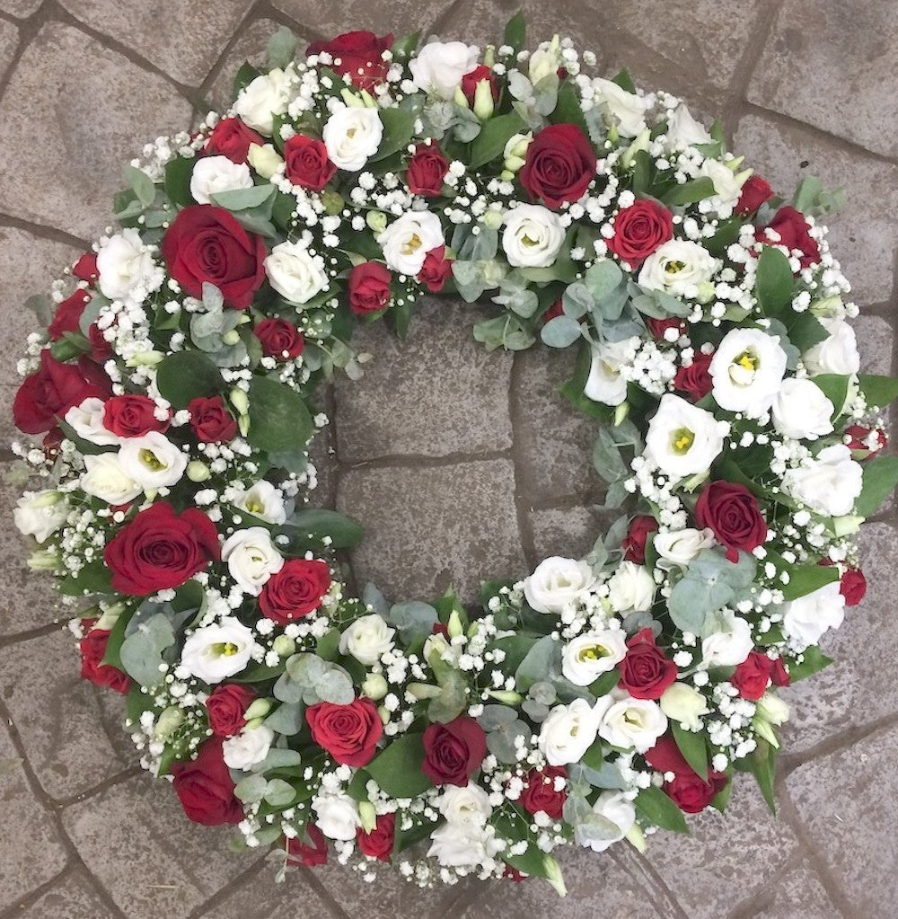 Coroana funerara rotunda din trandafiri rosii, livrare Bucuresti