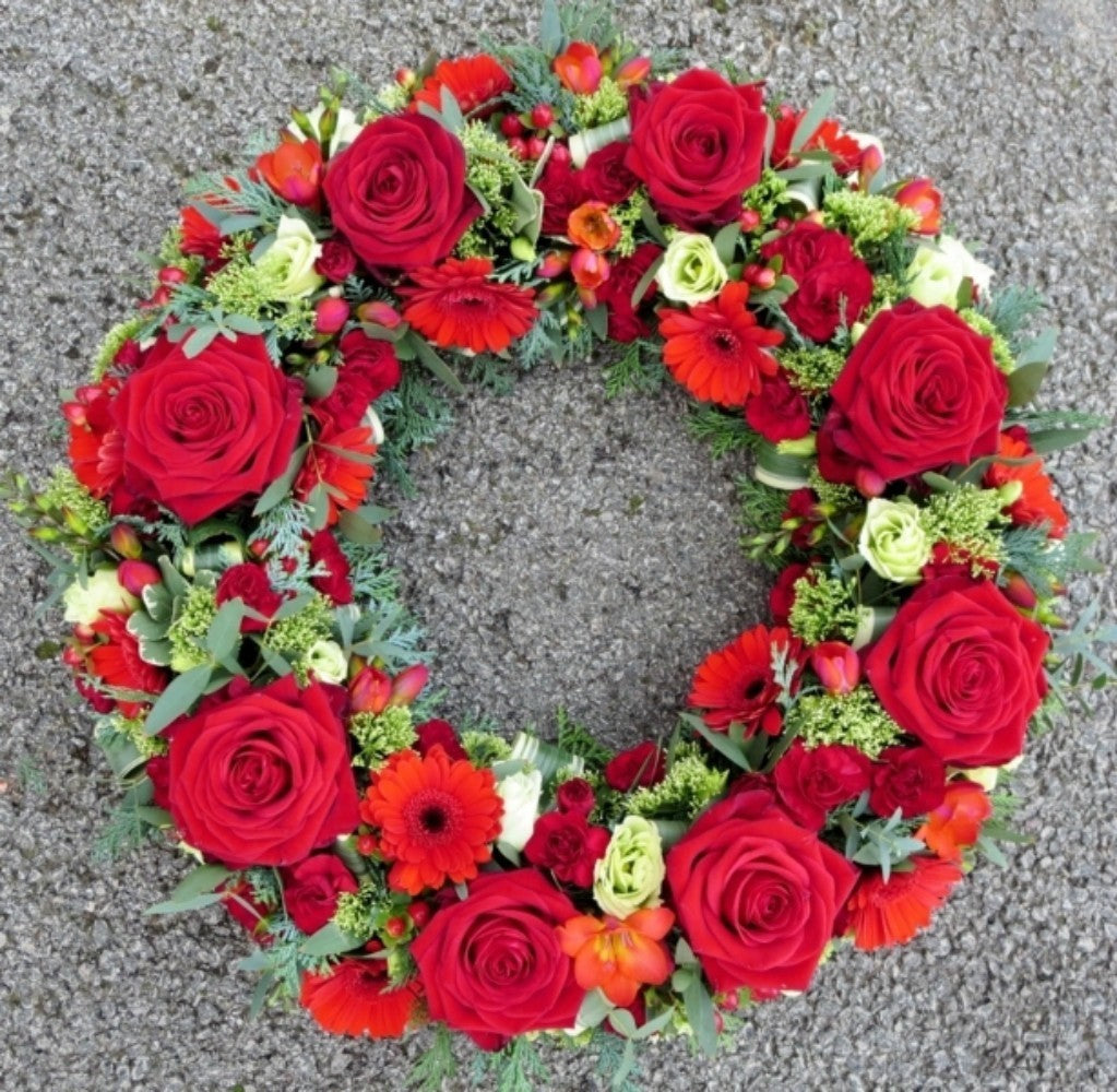 Aranjament funerar cu gerbera, trandafiri si frezii