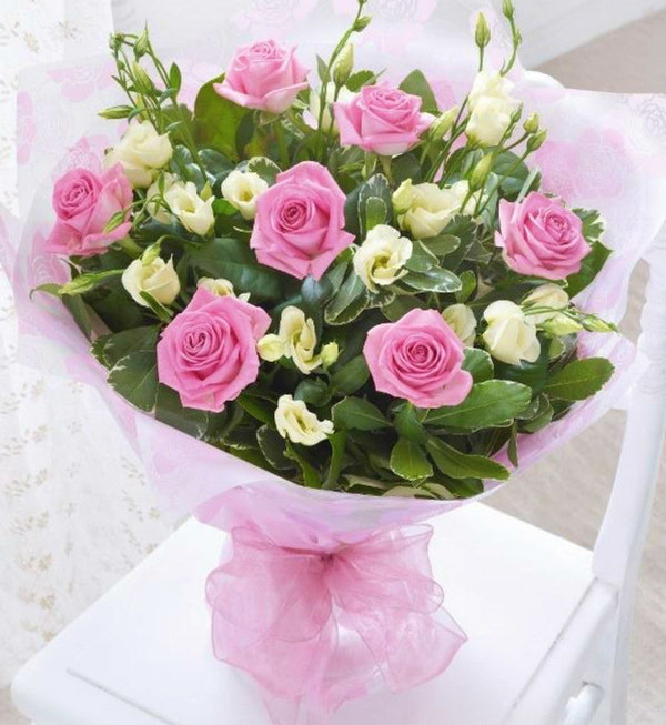 Bouquet to offer with roses and lisianthus