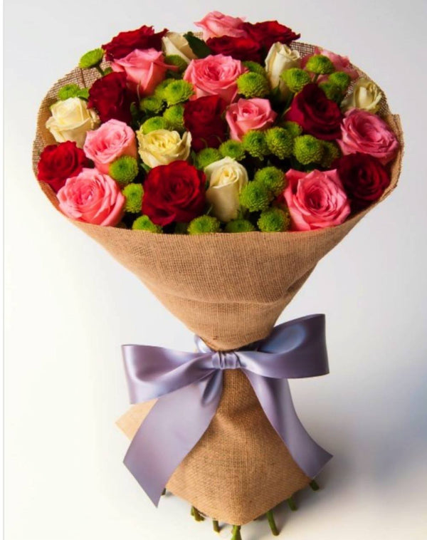 Bouquet to offer with colored roses and santini