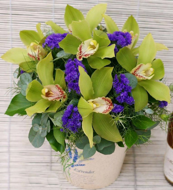 Aranjament floral cu orhidee cymbidium si limonium