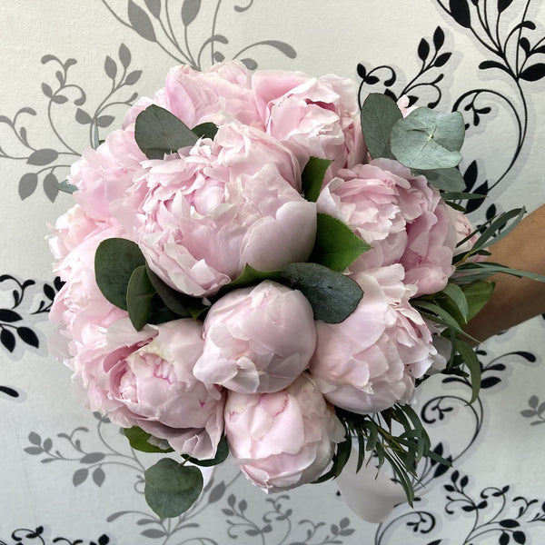 Bridal bouquet of pink peonies