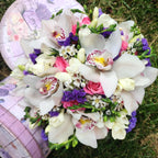 Bridal bouquet of cymbidium orchids and mini roses