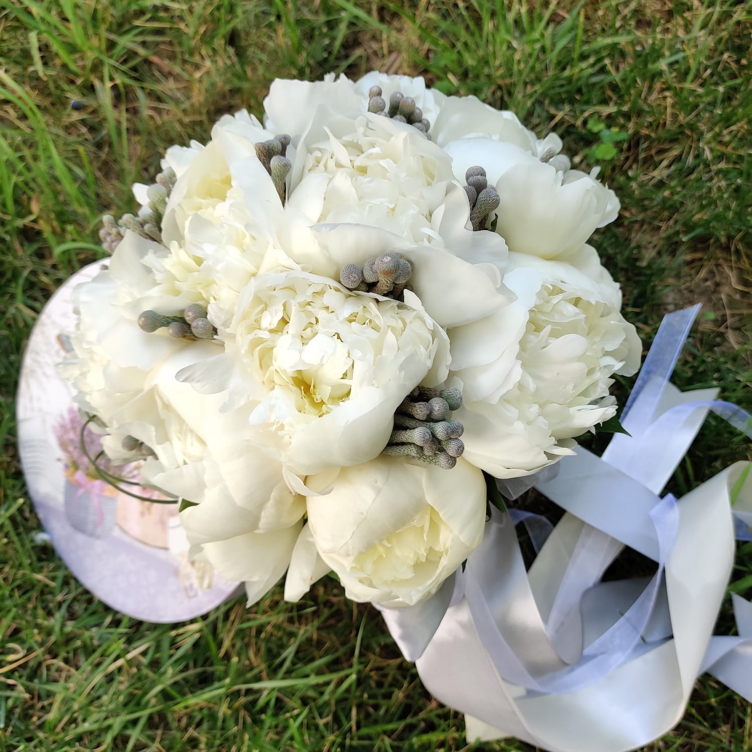 Bridal bouquet of peonies and brownies