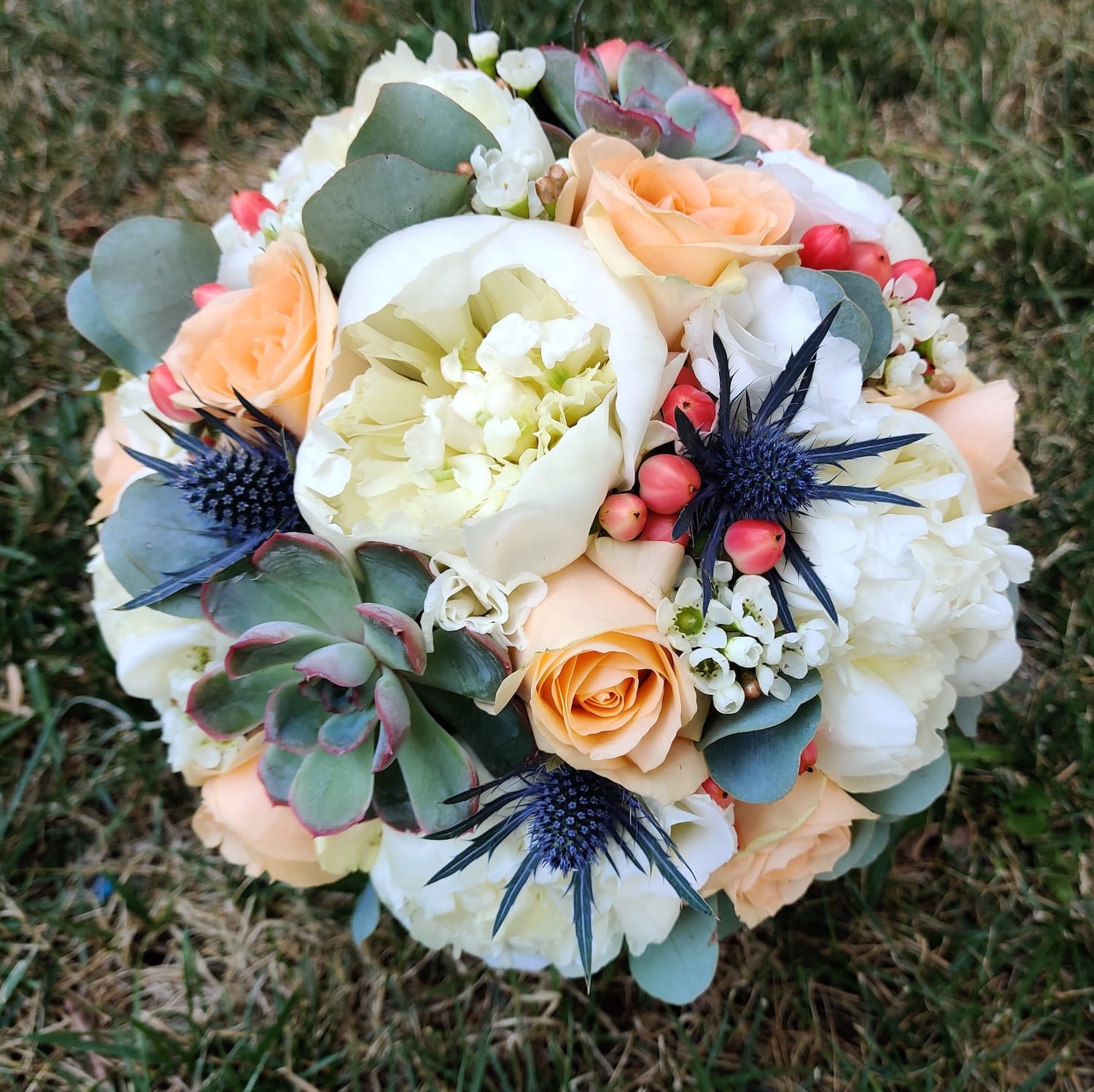 Bridal bouquet of peonies and roses