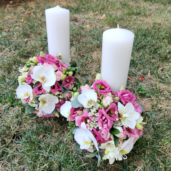 Short lisianthus and orchid wedding candles