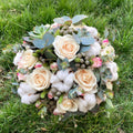 Bridal bouquet of cream and cotton roses